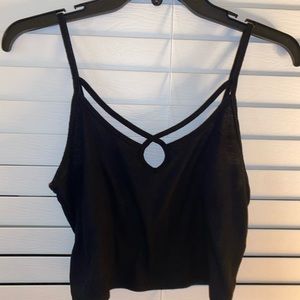 Black crop top/ tank top. Worn twice. Soft and stretchy material. Size M.